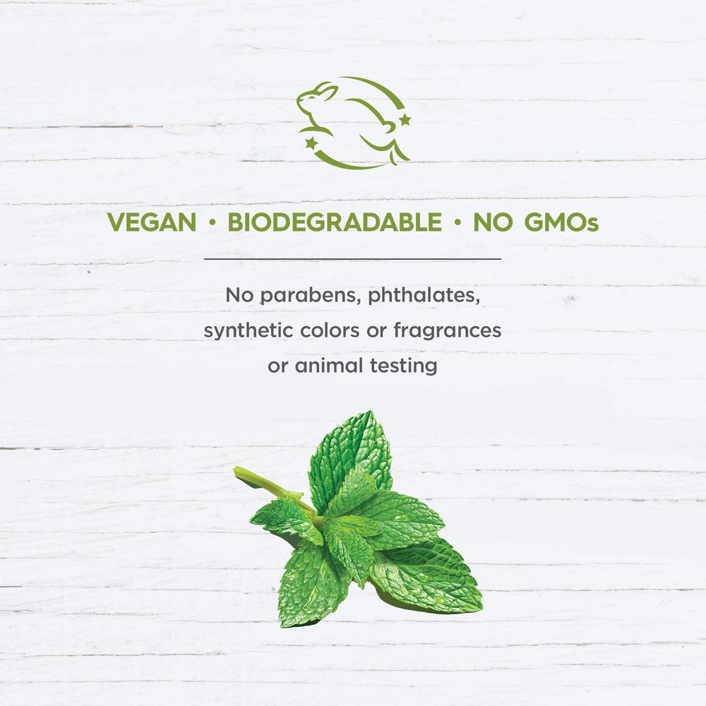 Avalon Organics bottle held in hand showing 32 oz scale