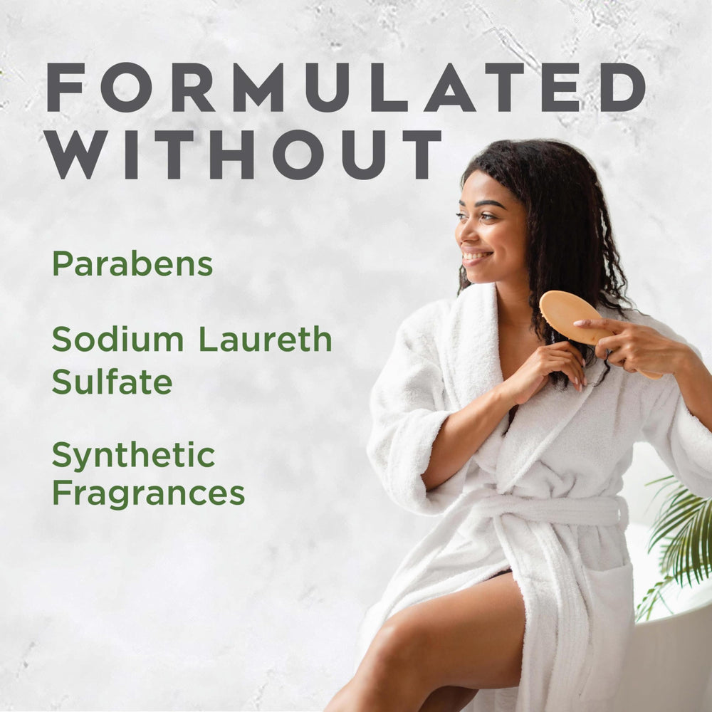 Avalon Organics shampoo texture poured on hand showing silky lather