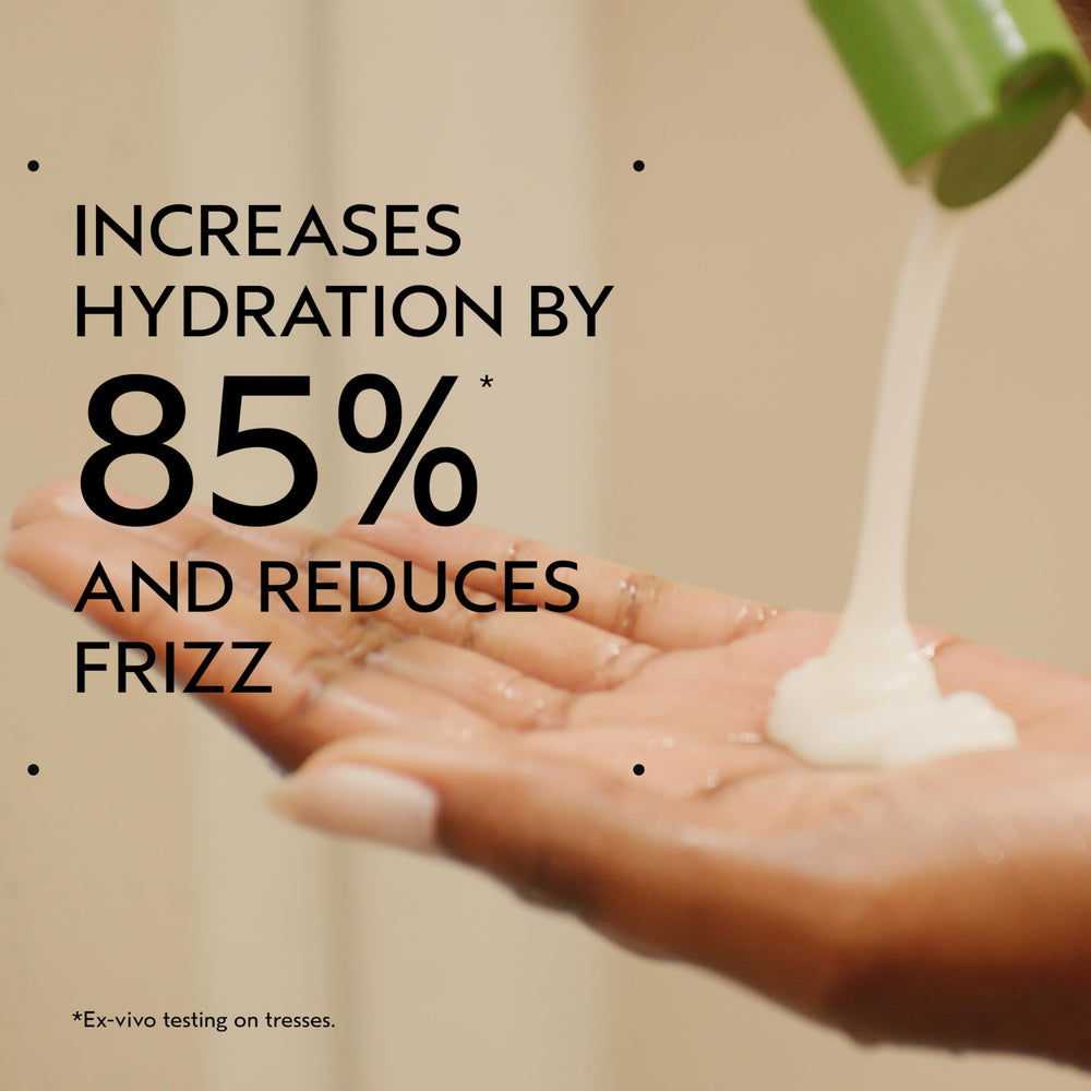 AVEDA product being pumped to show creamy co-wash consistency and gentleness benefit