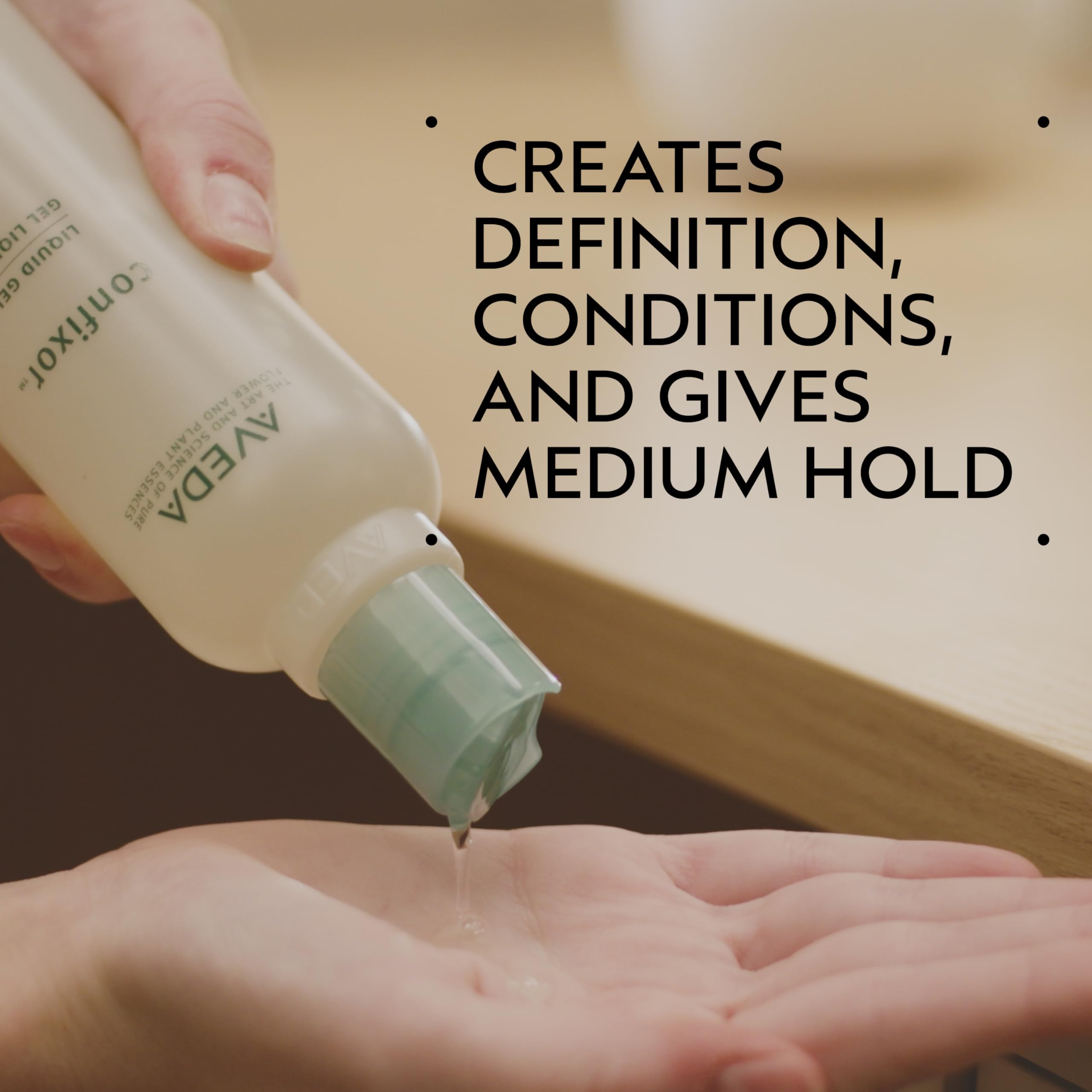AVEDA Confixor pump dispenser close-up for easy use and precise application benefit