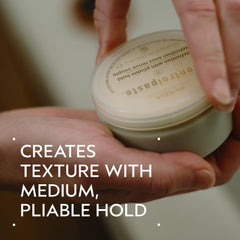 AVEDA paste texture close-up demonstrating creamy matte consistency for easy styling