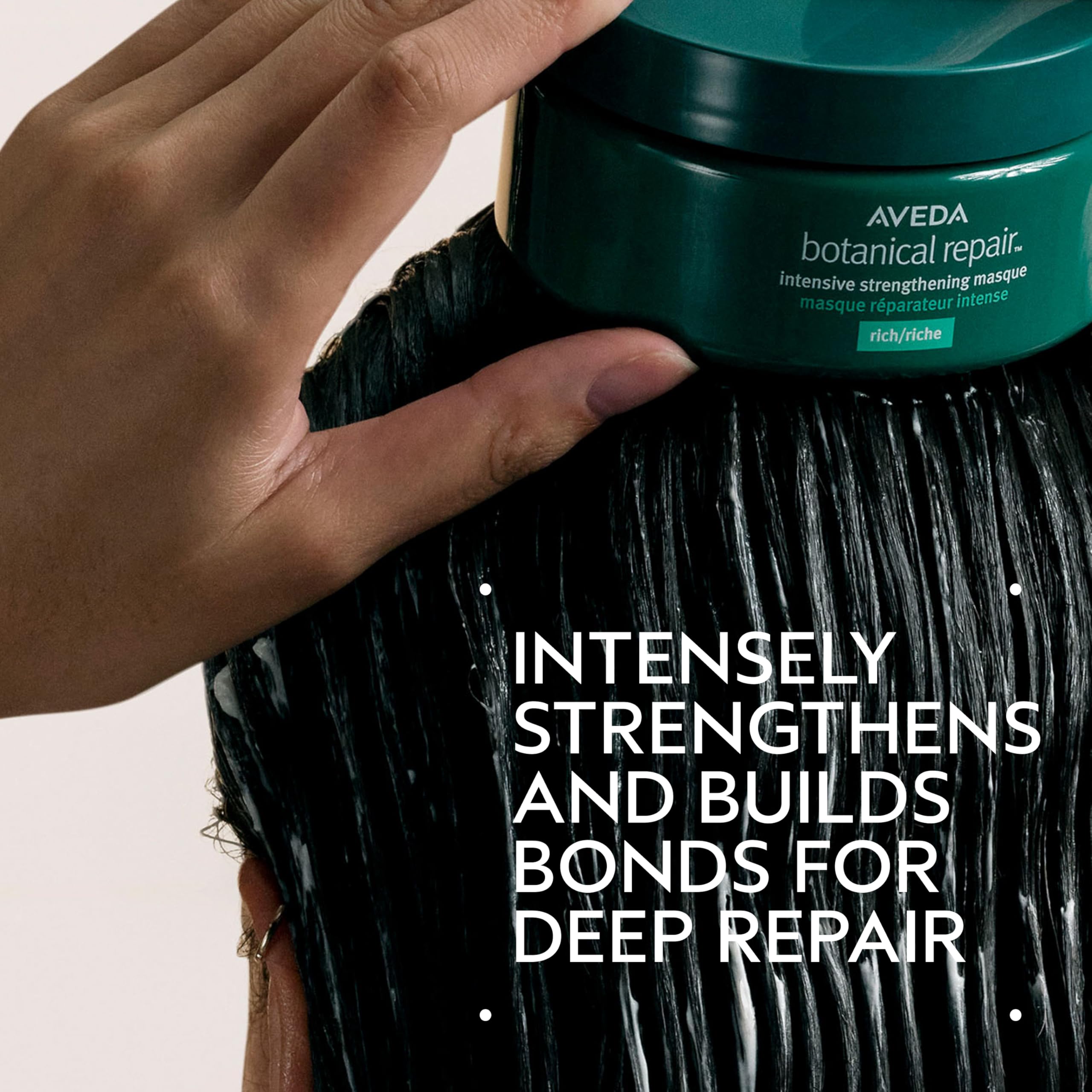 AVEDA open jar with rich creamy texture highlighting nourishing slip benefit