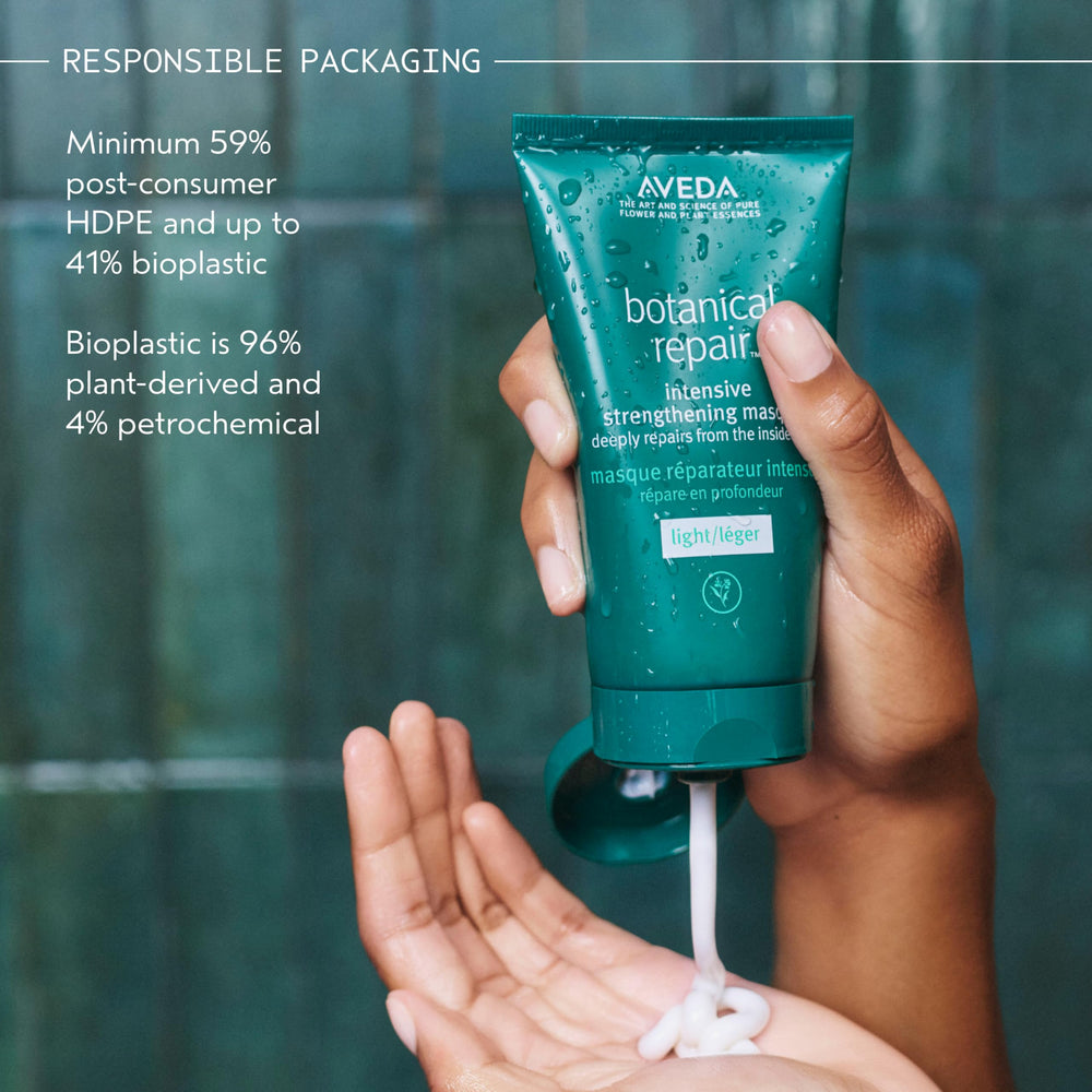AVEDA jar next to hand for scale showing 5 fl oz size