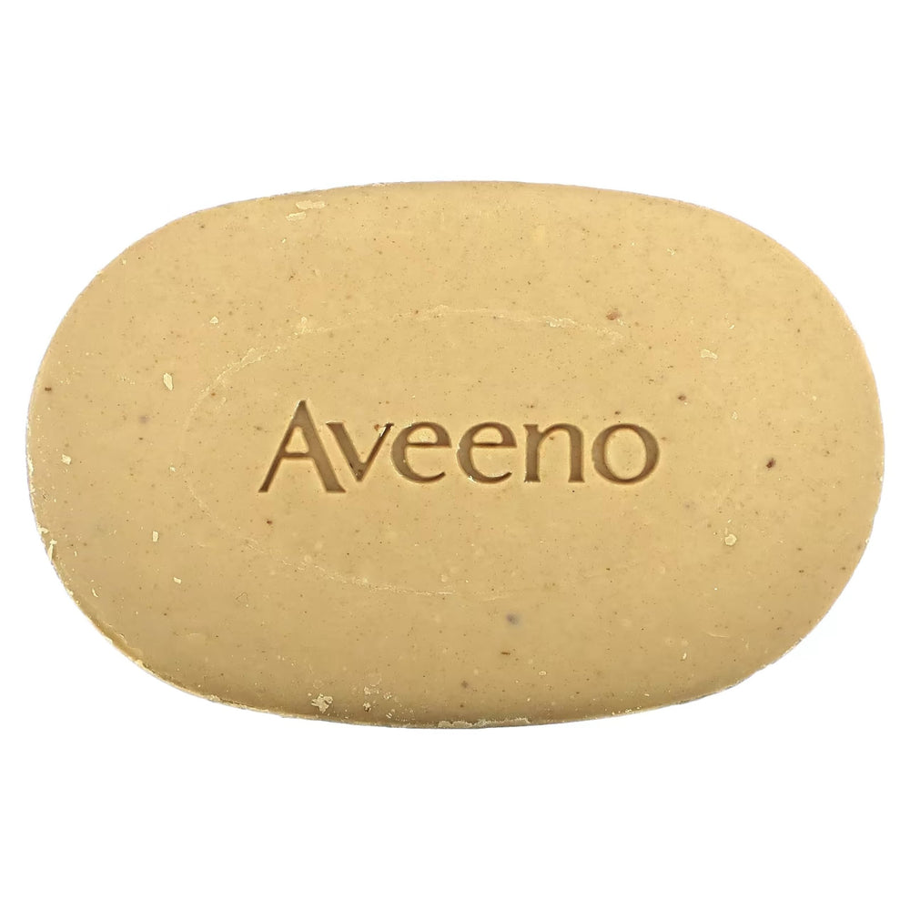 Aveeno bar in a hand for size comparison illustrating compact travel-friendly benefit