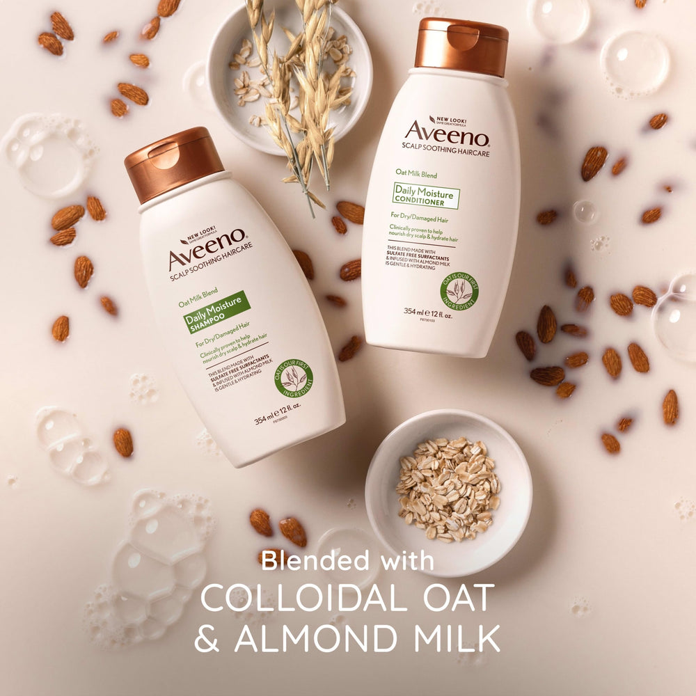 Aveeno bottle in hand showing 12 fl oz size and travel-friendly benefit