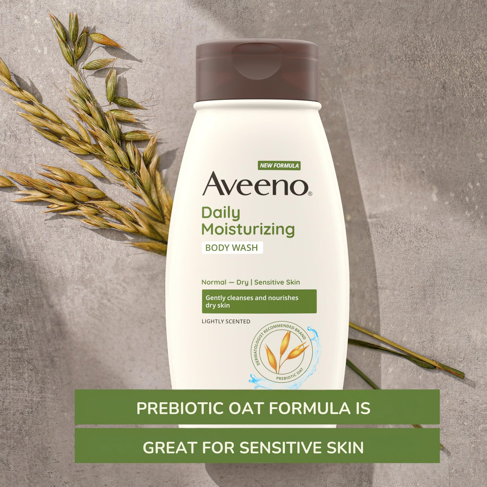 Aveeno bottle dispensing creamy lather for gentle cleansing benefits