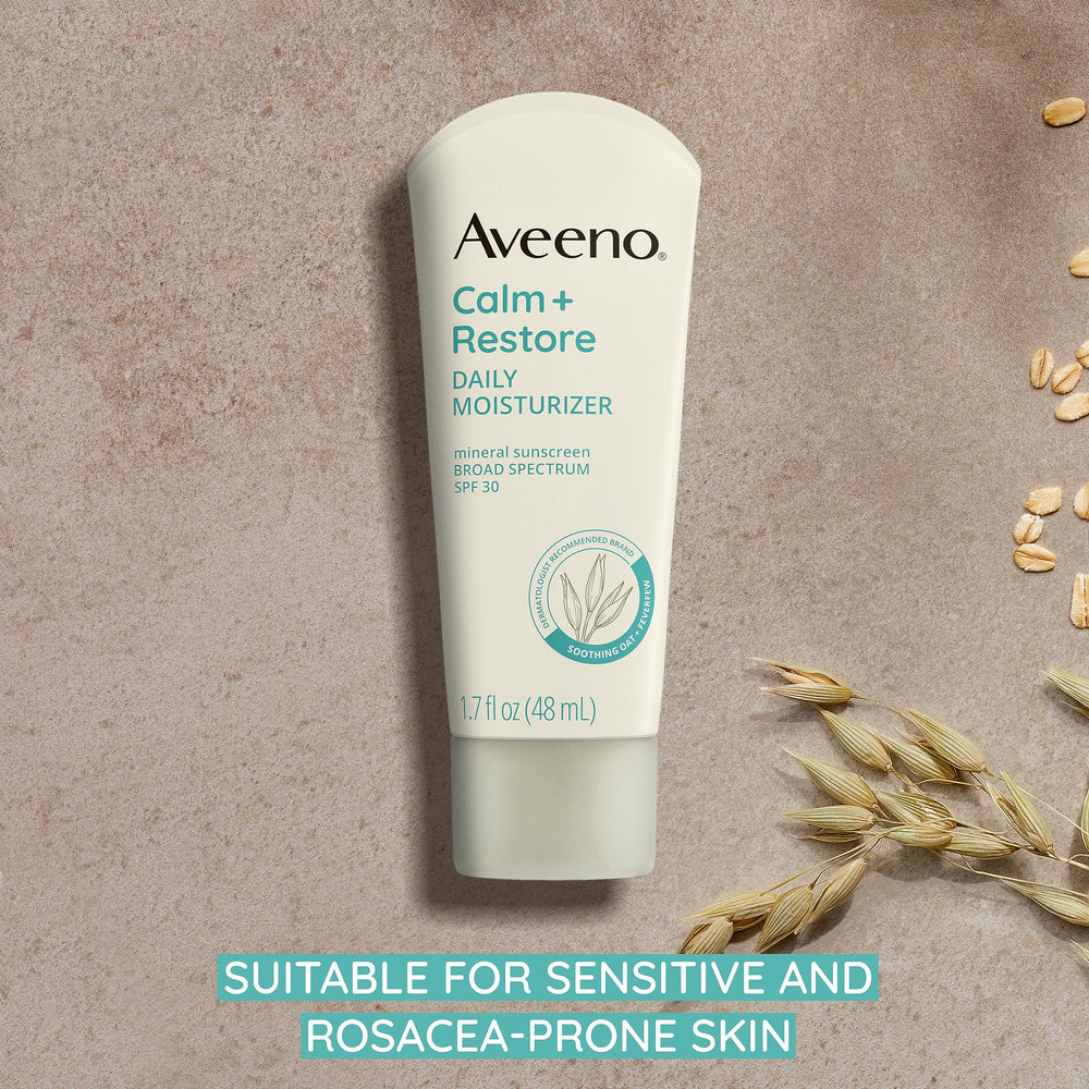 Aveeno next to credit card showing 1.7 fl oz travel-friendly size convenience