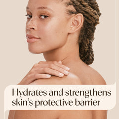 Aveeno bottle held in hand to show 33 fl oz scale for family use