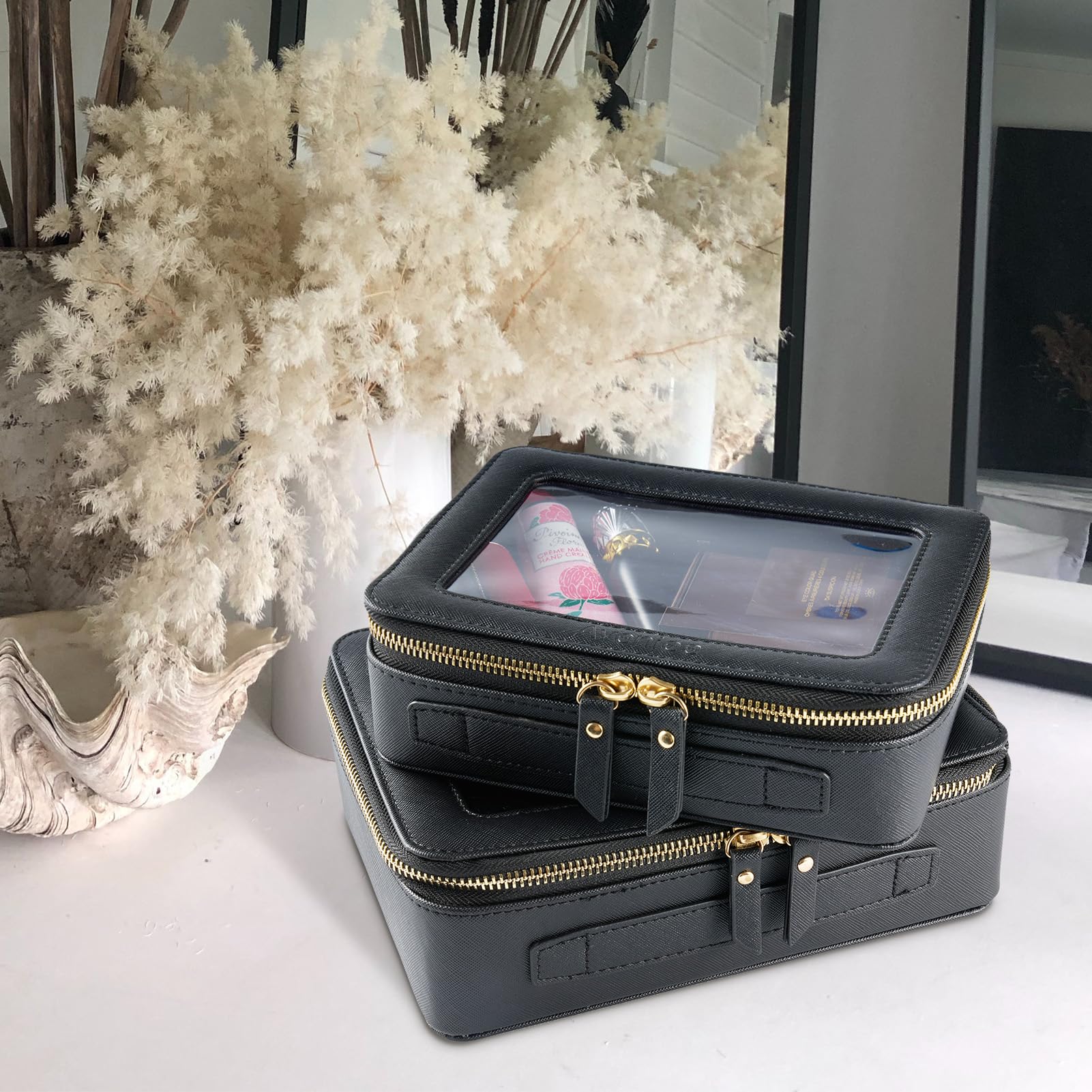 Aveniee shown beside a phone to demonstrate compact size and portability