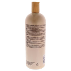 Avlon Keracare creamy lather in hand illustrating gentle cleansing and improved slip