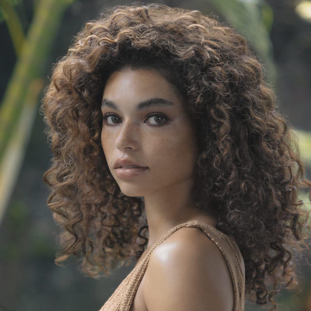 Close-up of HydroMist texture on hair for weightless-volume benefit