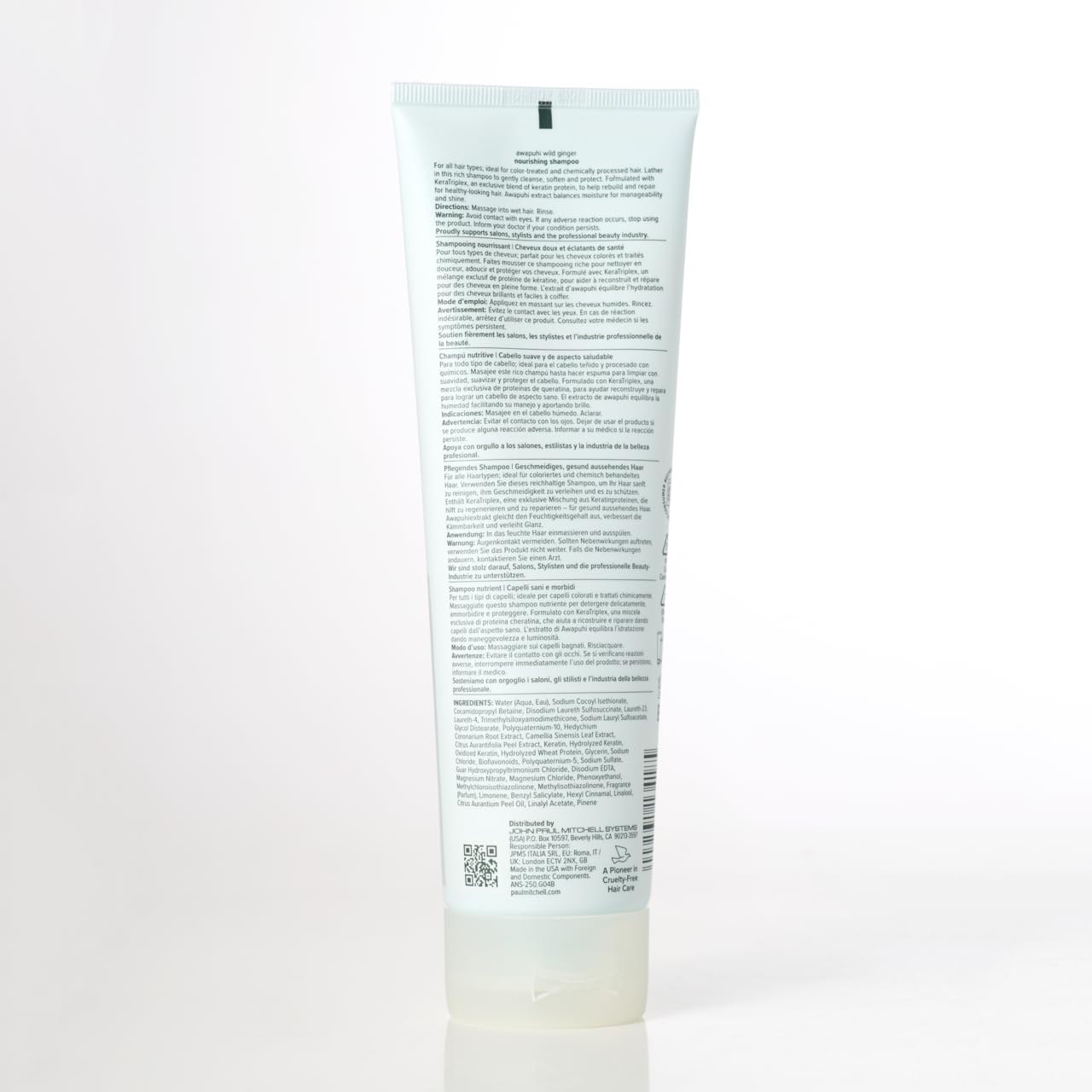 Awapuhi Wild Ginger bottle beside hand to show 33.8 fl oz scale