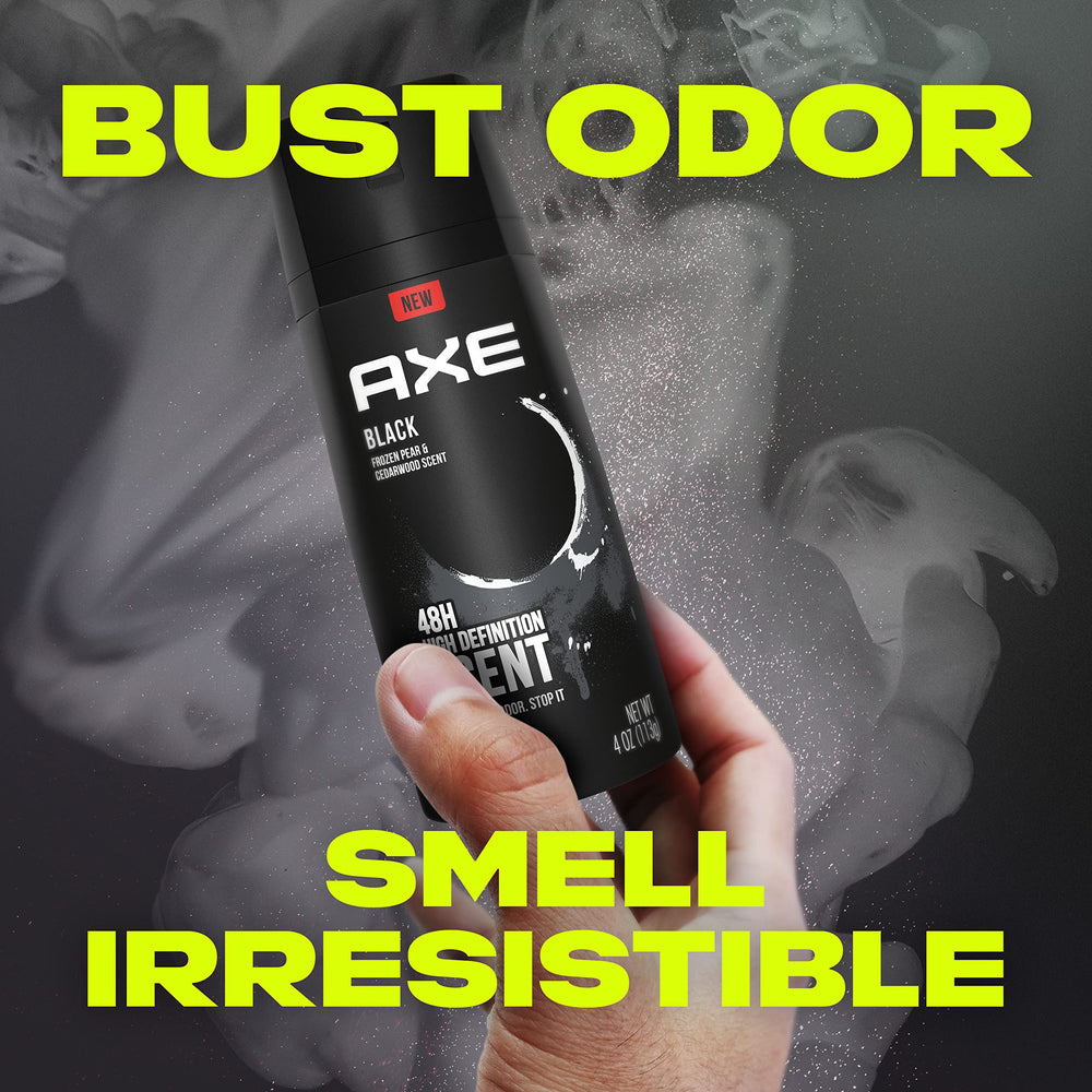 AXE Black can next to a ruler showing 4oz scale for travel convenience benefit