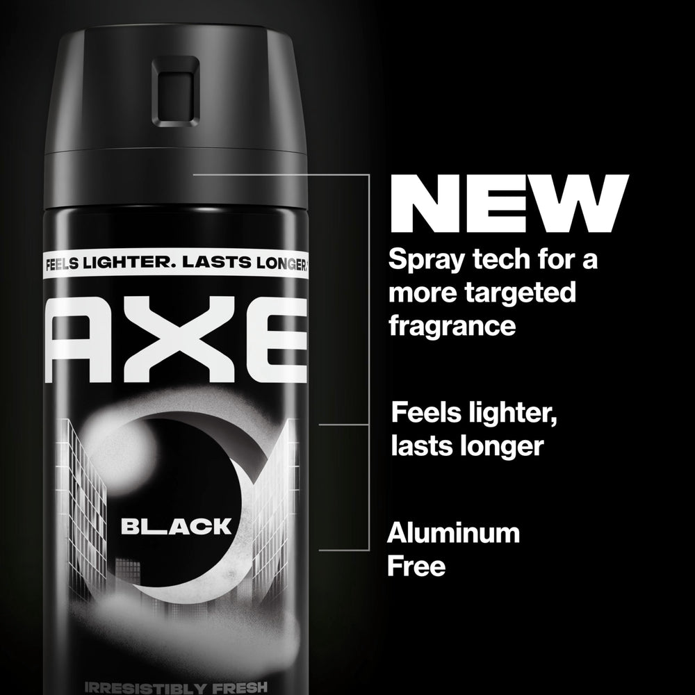 AXE Black next to smartphone for scale showing compact 2.9 oz travel convenience