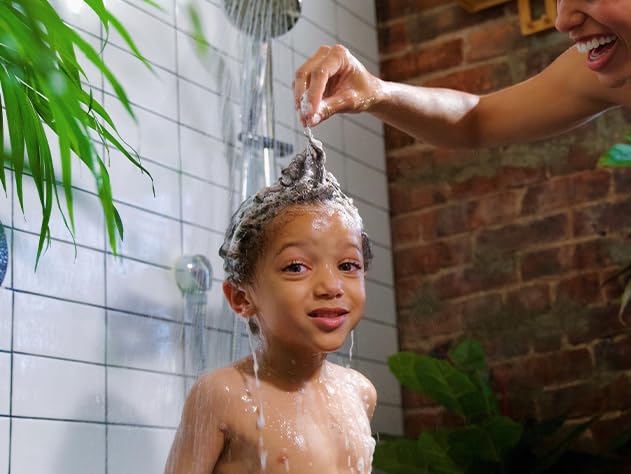 Babo Botanicals bottle in bathroom setting suggesting spa-like experience