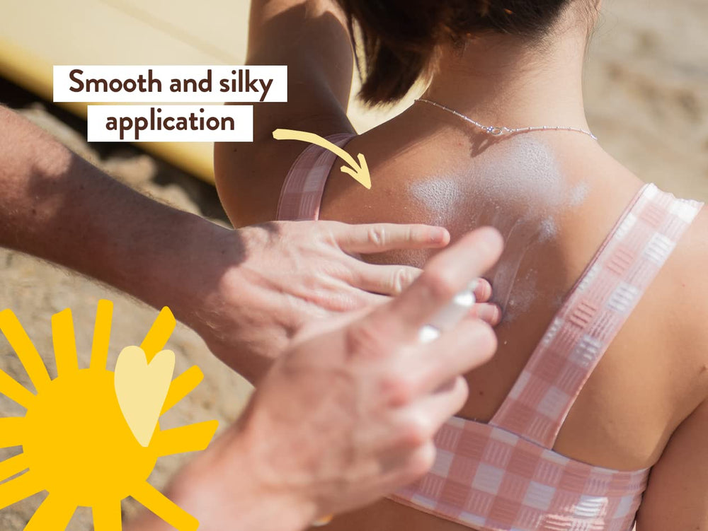 Babo Botanicals parent applying sunscreen to child highlighting family-friendly safety