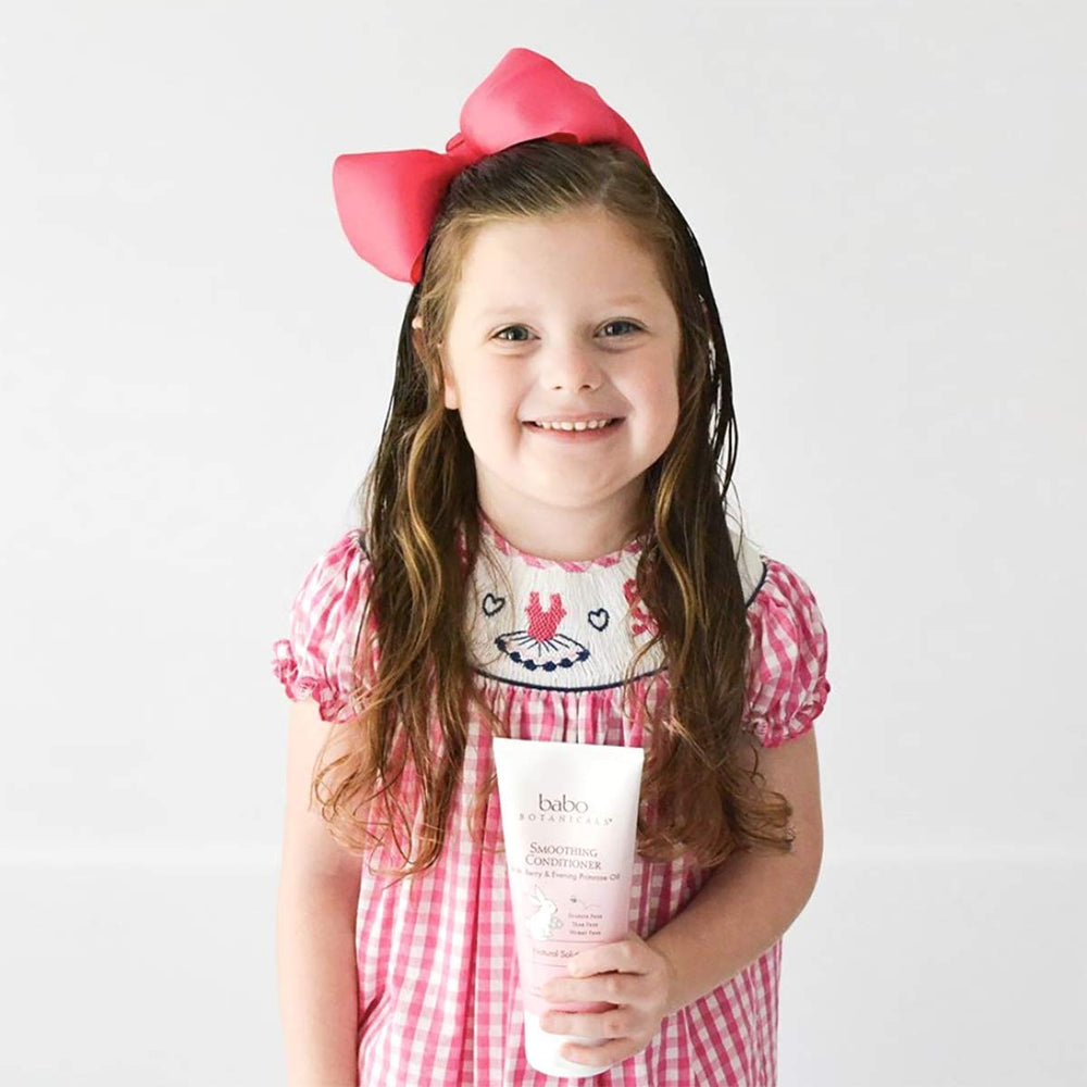 Babo Botanicals styled hair after use showing reduced frizz and shine benefit