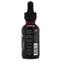 Badass Beard Care oil in hands showing texture and quick-absorbing benefit