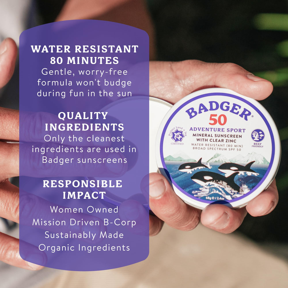 Badger sunscreen tin on sand demonstrating reef-safe outdoor protection