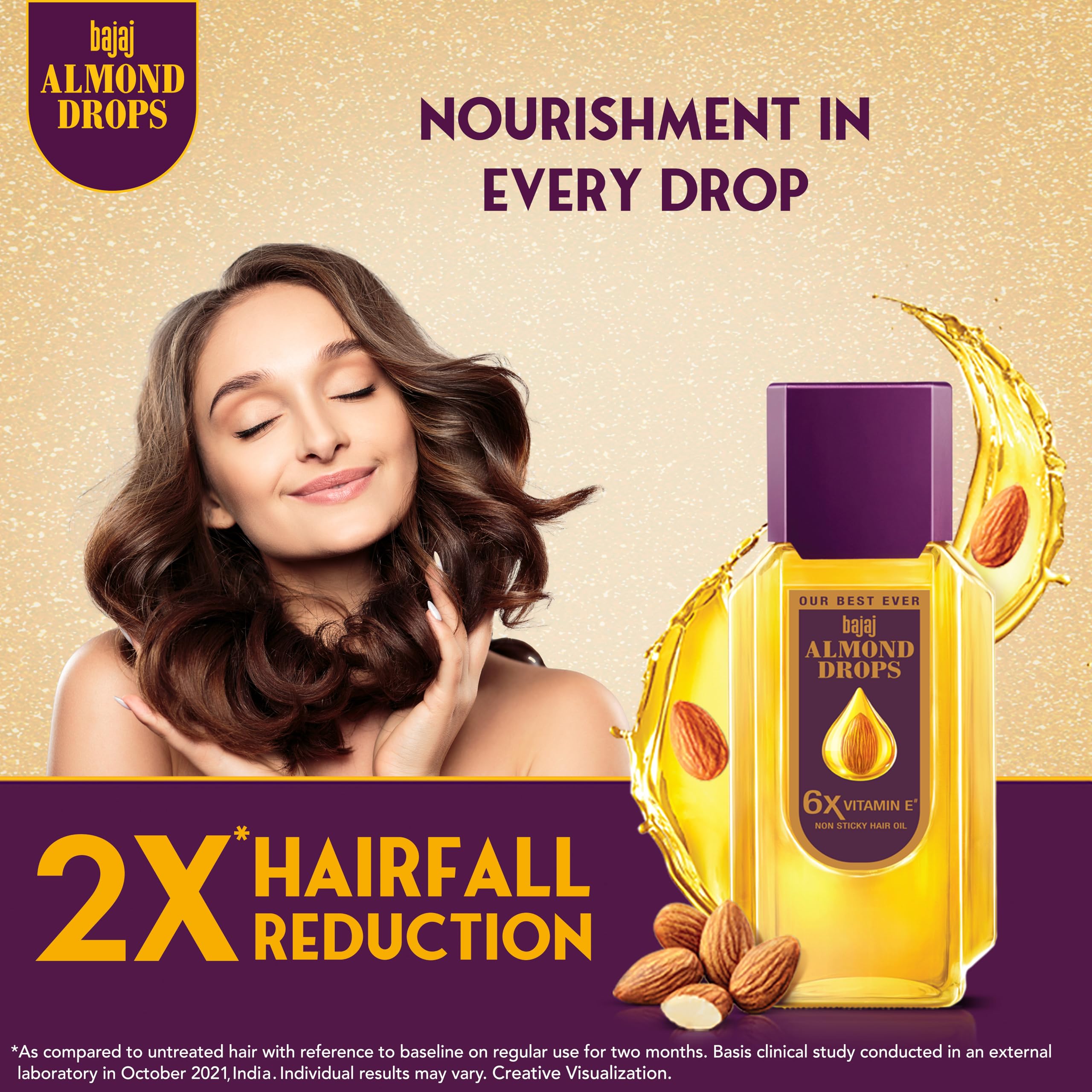 Bajaj Almond Drops oil texture drop on skin showing lightweight absorption benefit