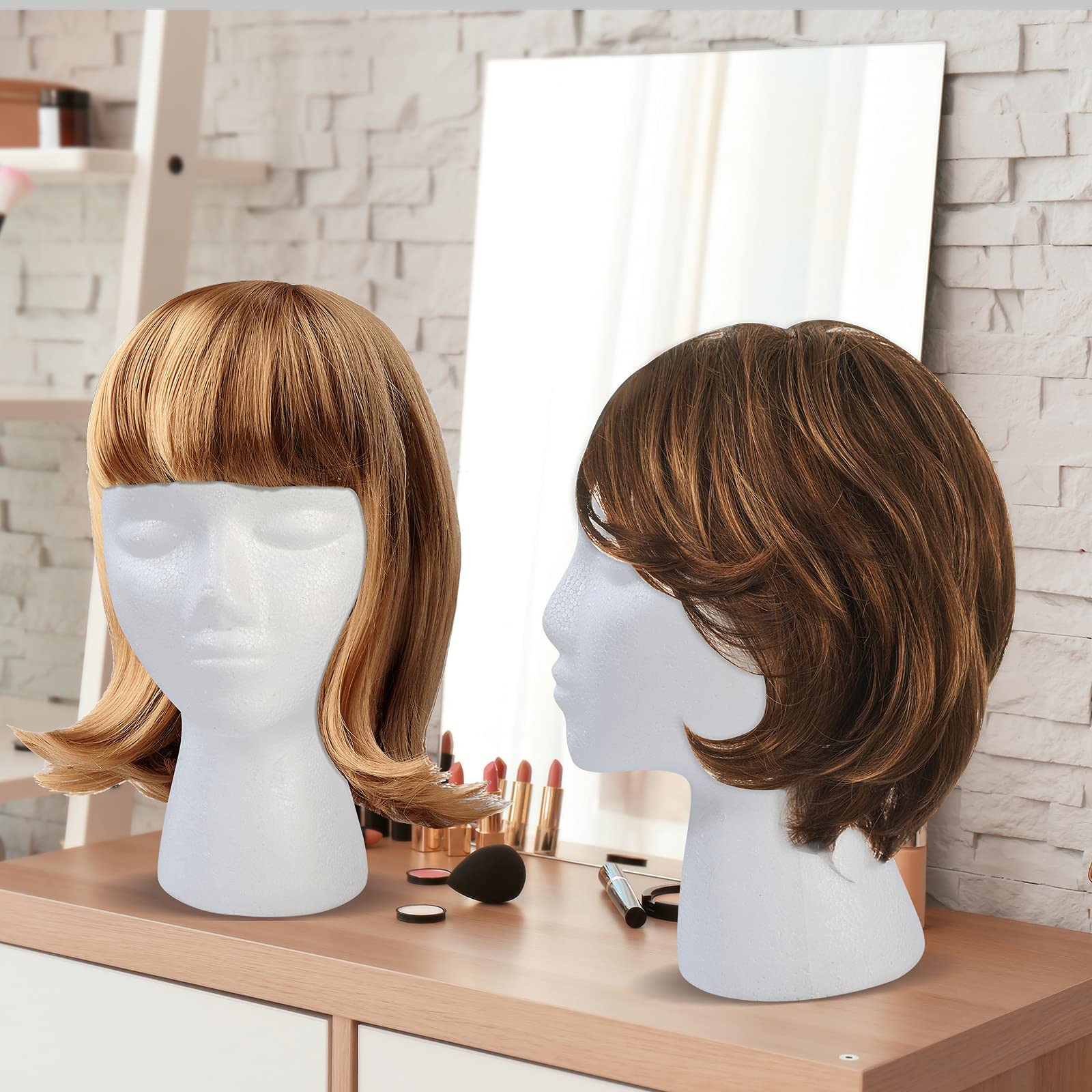 BALABALA foam head next to hand showing lightweight travel-friendly size