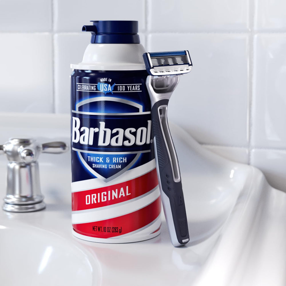 Barbasol Ultra 6 Plus held in hand to show size and ergonomic control