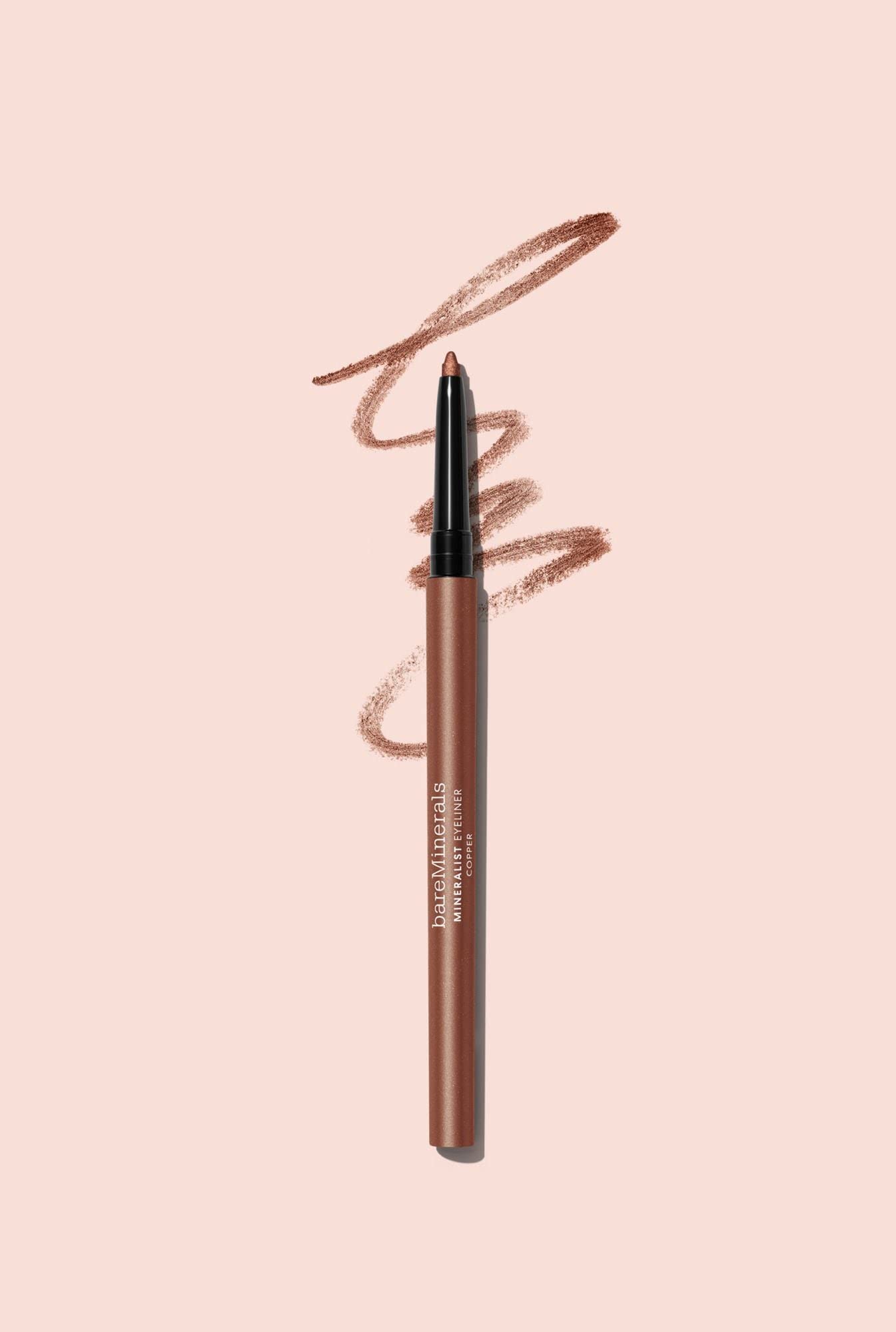 bareMinerals Copper eyeliner held in hand to show size and travel-friendly convenience