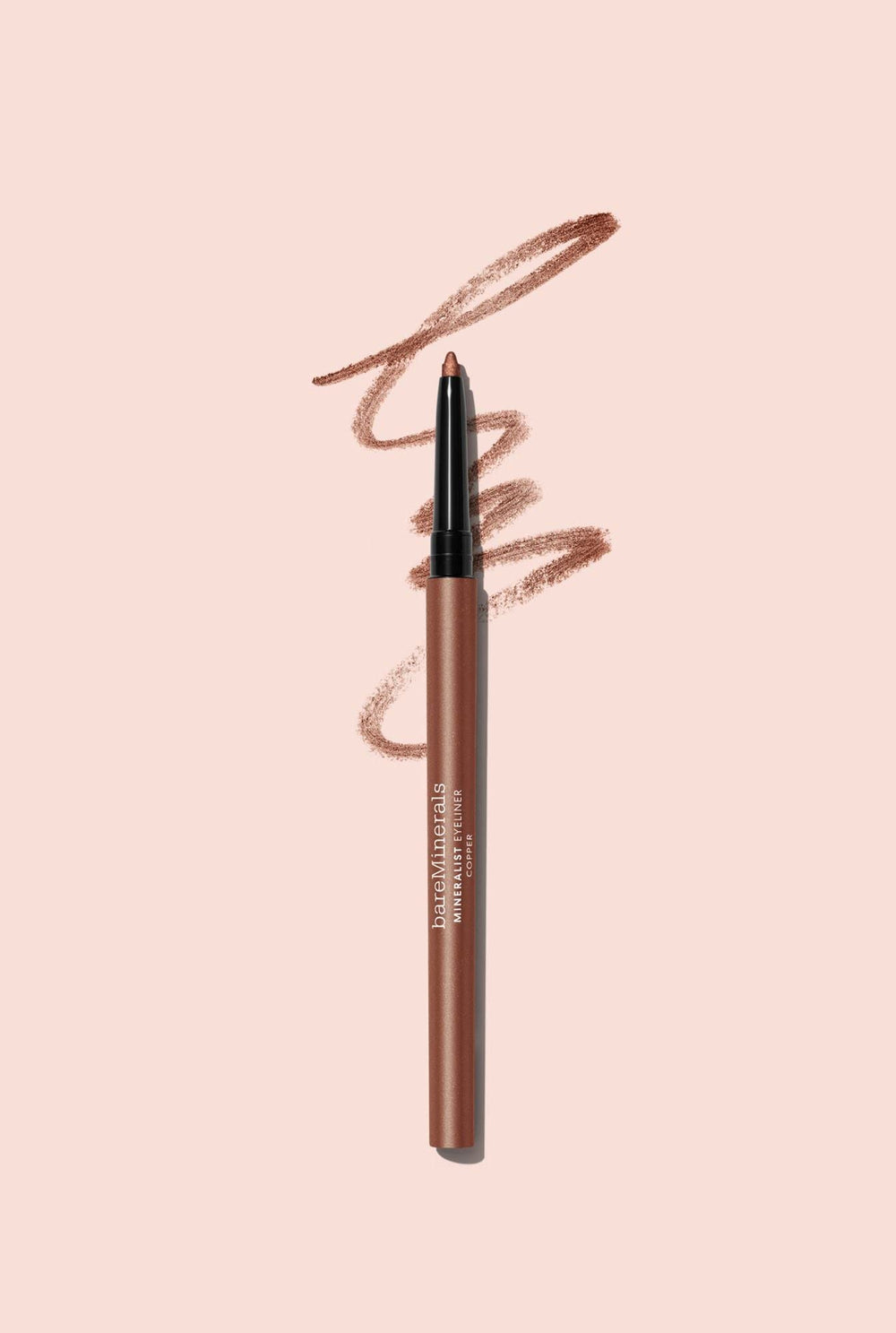 bareMinerals Copper eyeliner held in hand to show size and travel-friendly convenience