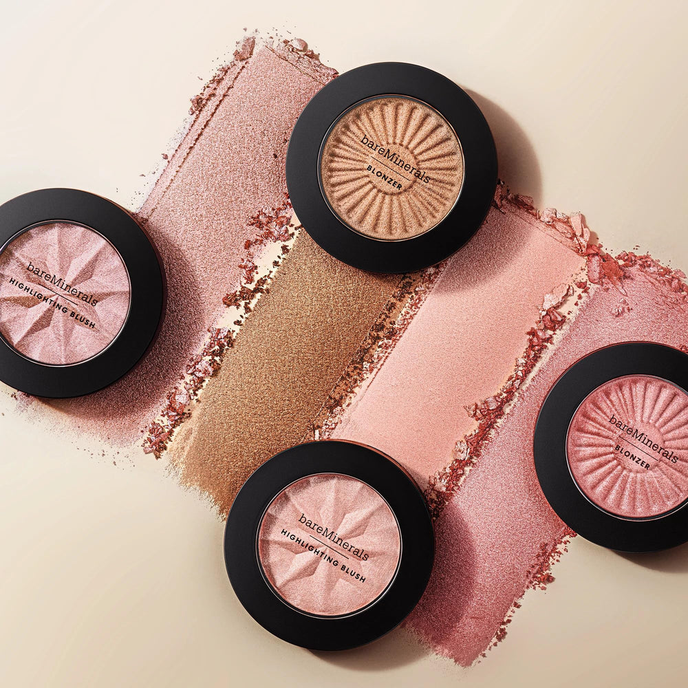 bareMinerals small brush placing color on eyelid for subtle shimmer