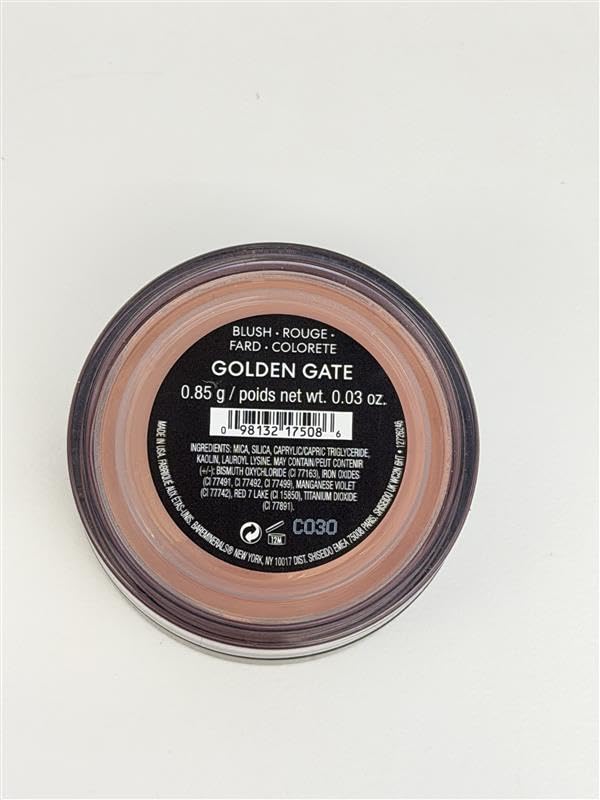bareMinerals jar in hand for scale showing travel-friendly 0.03 oz size