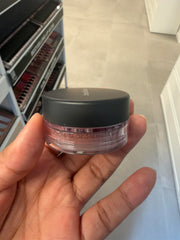 bareMinerals texture detail with a swirl of powder showing buildable sheen
