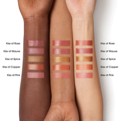 bareMinerals product swatched on hand showing buildable rosy-bronze benefit