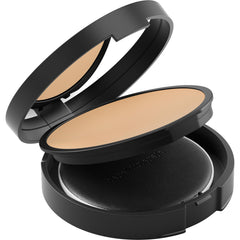 bareMinerals puff applying powder to nose area for targeted shine control