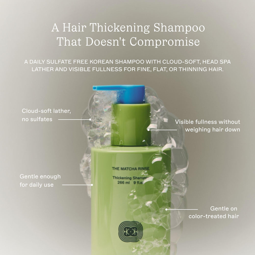 BASE-K shampoo lathered on hand highlighting thick foam benefit