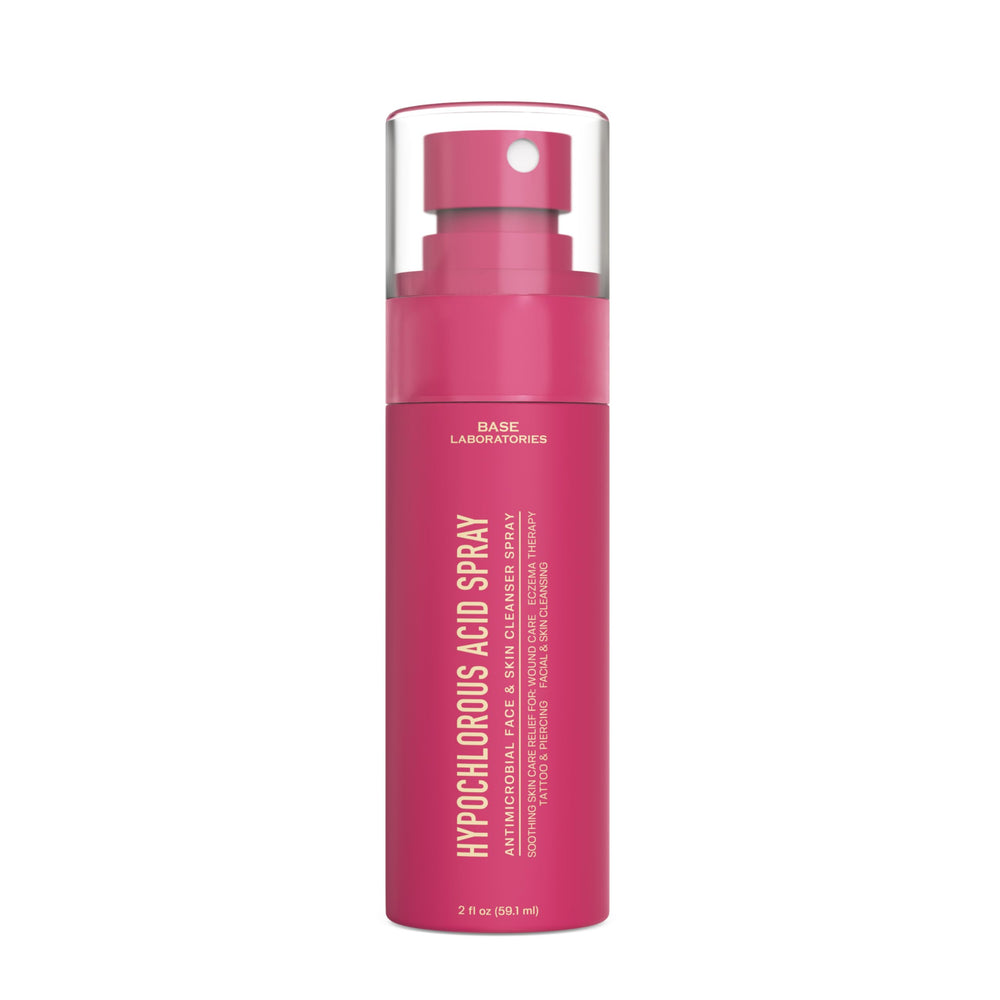 BASE LABORATORIES user spraying face outdoors for instant skin refresh