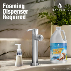 Bastion pouring refill into dispenser demonstrating waste reduction benefits