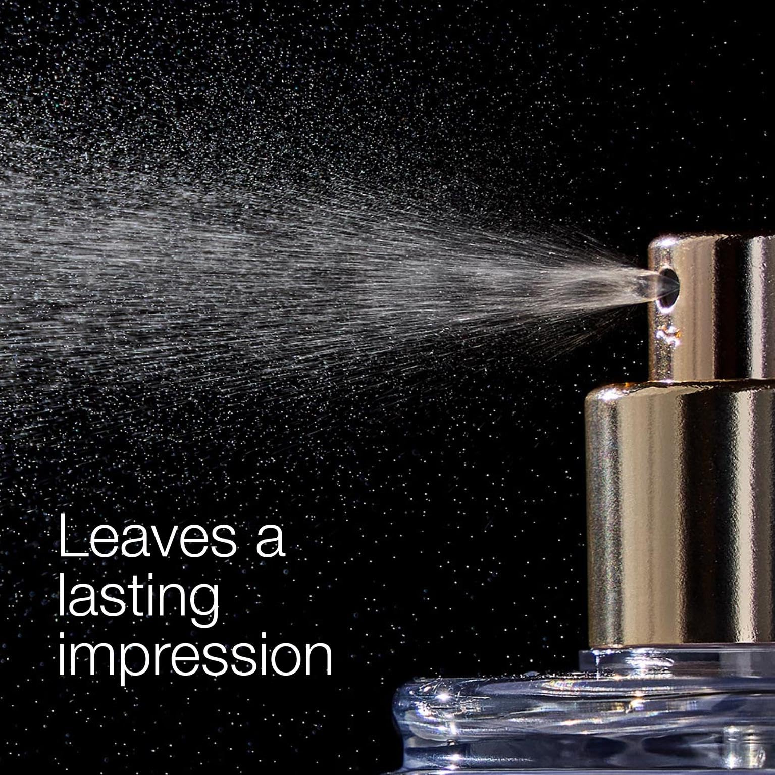 Bath & Body Works spraying mist onto wrist showing light application benefit: subtle fragrance
