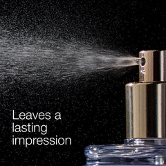 Bath & Body Works spraying mist onto wrist showing light application benefit: subtle fragrance