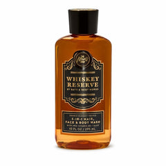 Bath & Body Works bottle front packaging showing Whiskey Reserve scent benefits