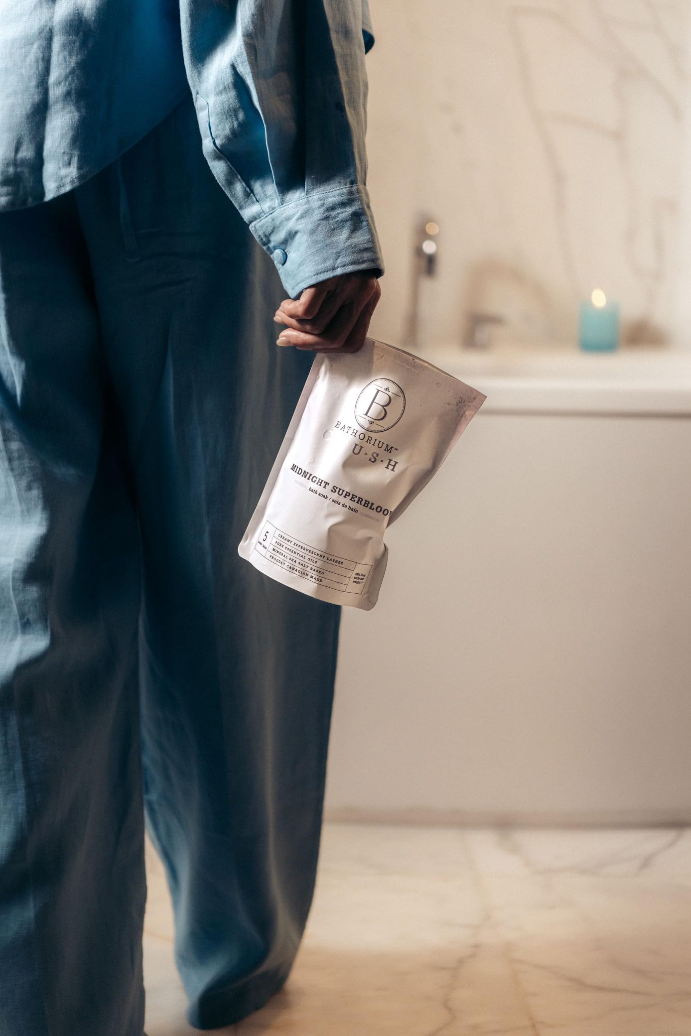 Evening bathroom scene with Bathorium soak creating spa-like relaxation at home