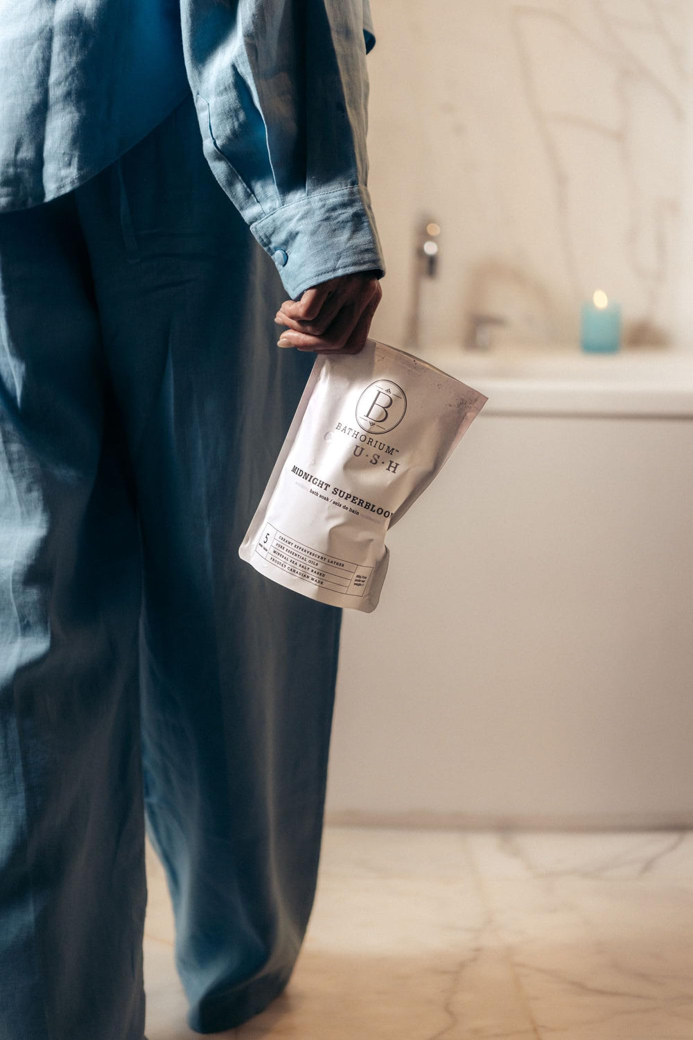 Evening bathroom scene with Bathorium soak creating spa-like relaxation at home