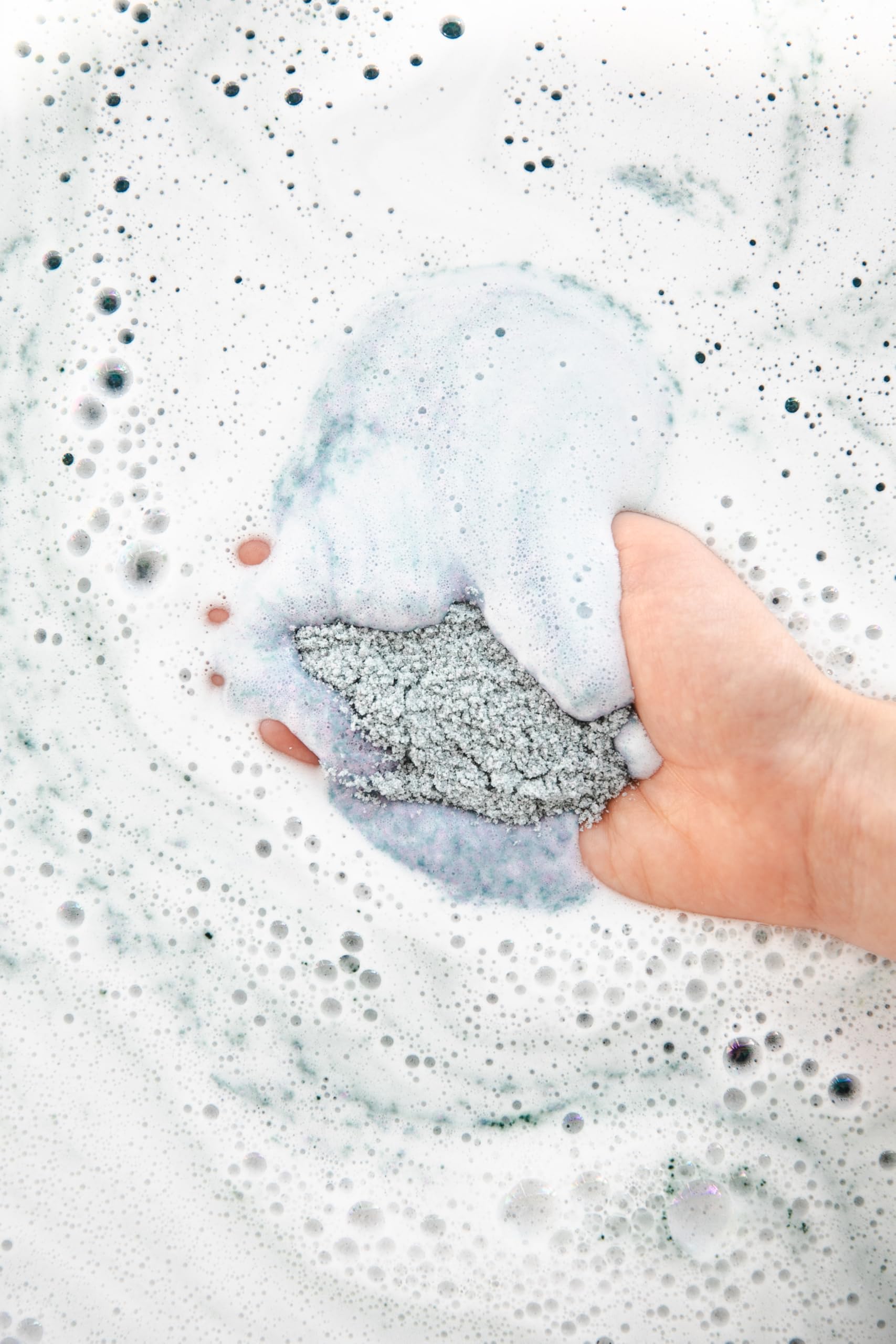 Tub surface with Bathorium creamy crema finish showing luxurious soak texture