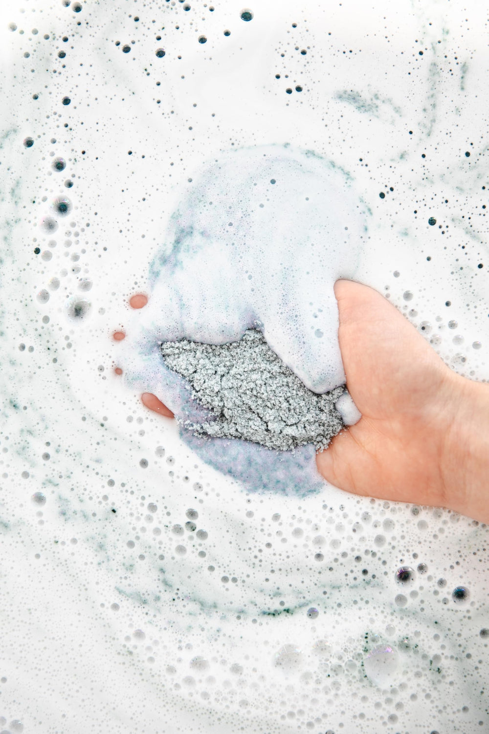 Tub surface with Bathorium creamy crema finish showing luxurious soak texture
