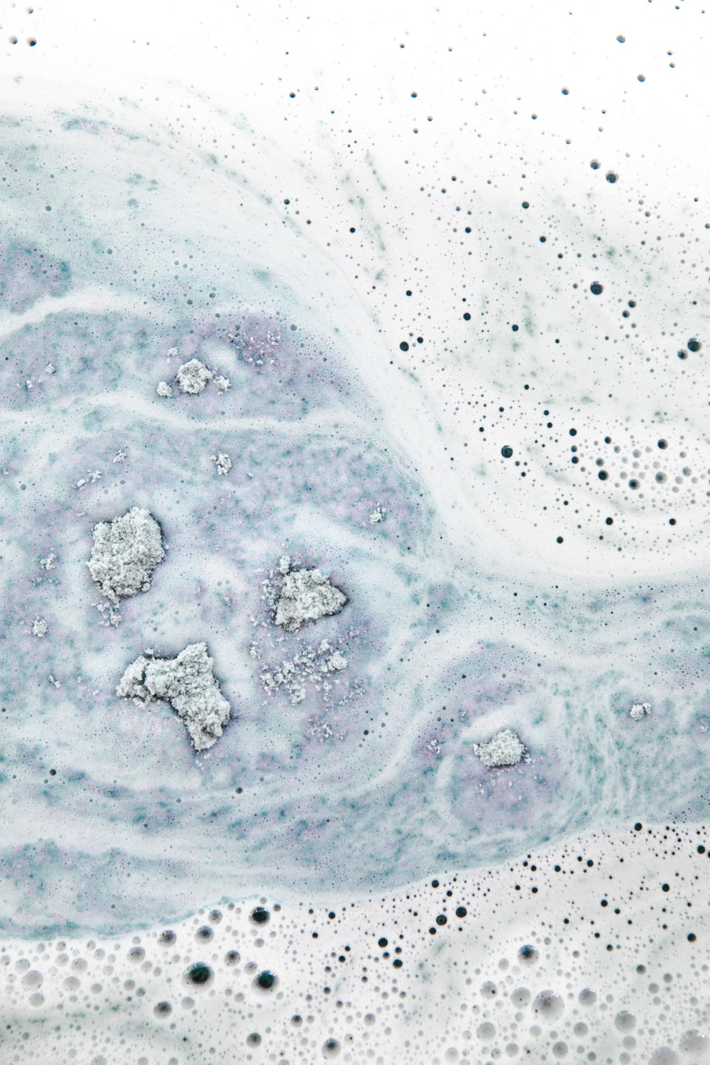 Ingredients plated with Bathorium rose and clay illustrating natural violet pigments