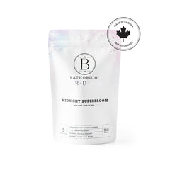 Bathorium powder pouring from pouch into hand highlighting easy-to-dissolve texture