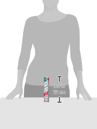 Person using Batiste cherry at roots in a bathroom, brand refreshing hair on the go