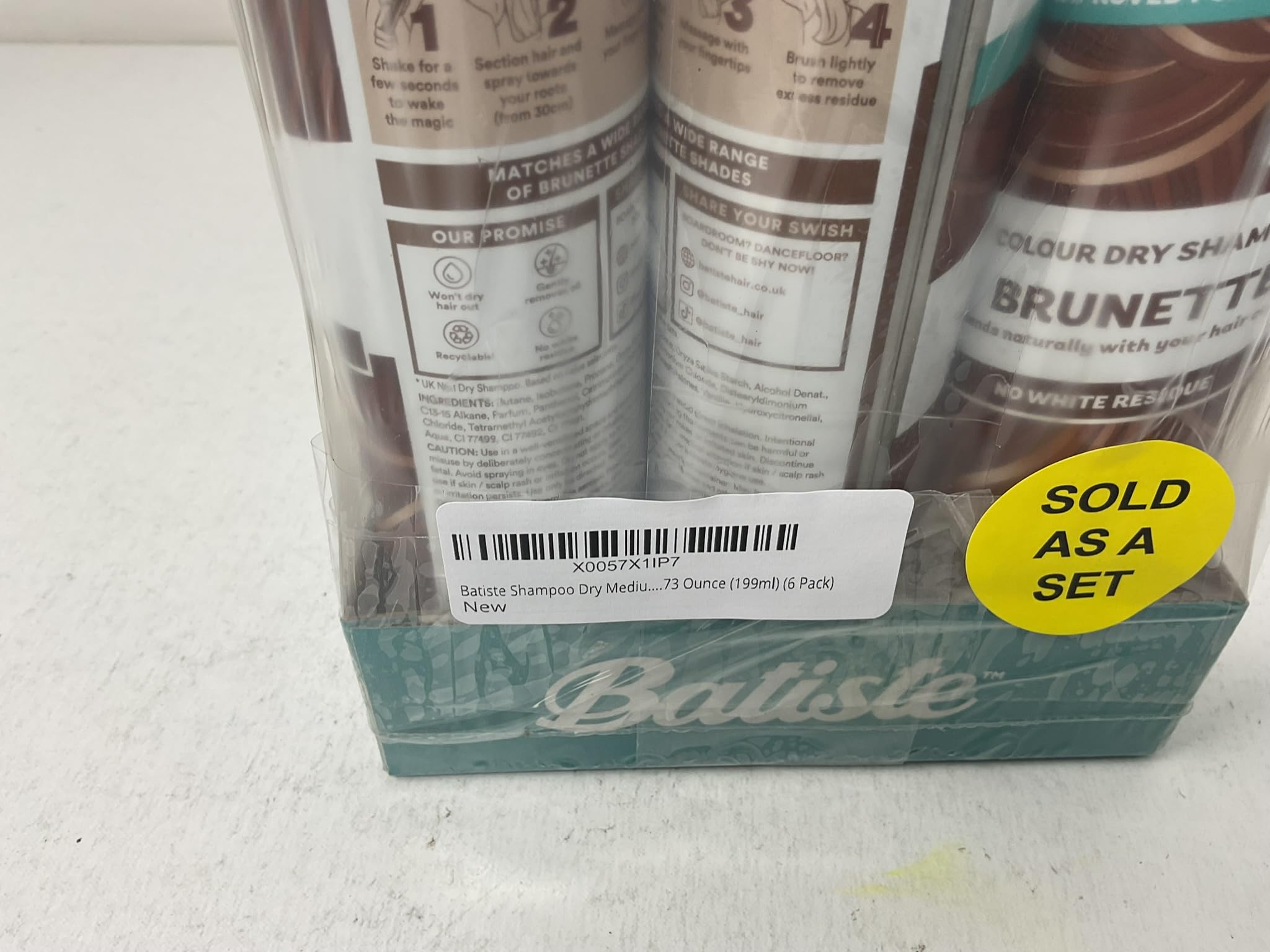 Batiste on bathroom shelf ready for fast touch-ups and travel