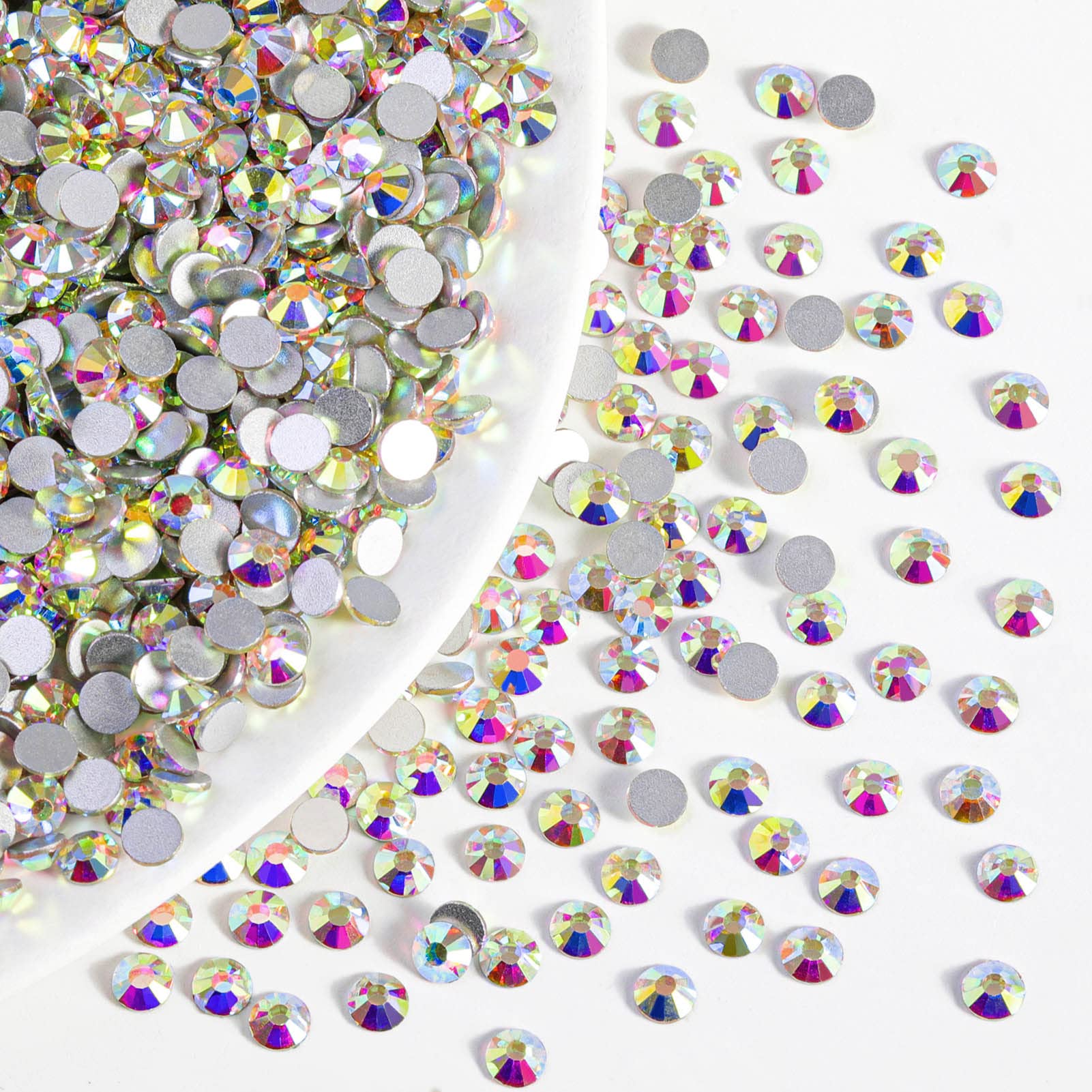 BEADSLAND rhinestones in hand showing SS20 scale for size comparison