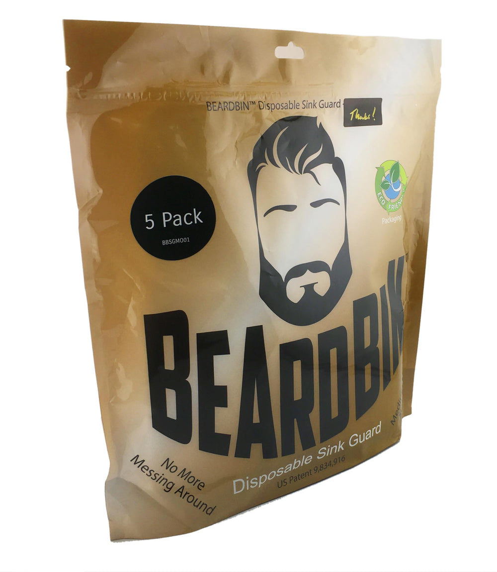 BeardBin beside a coin for scale illustrating compact single-sheet size