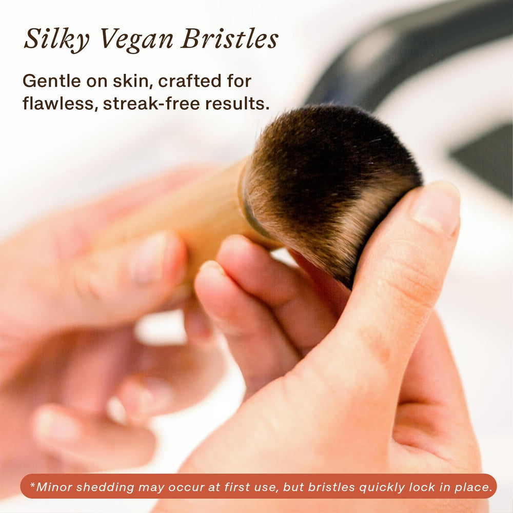 Beauty by Earth kabuki brush size comparison in hand for control